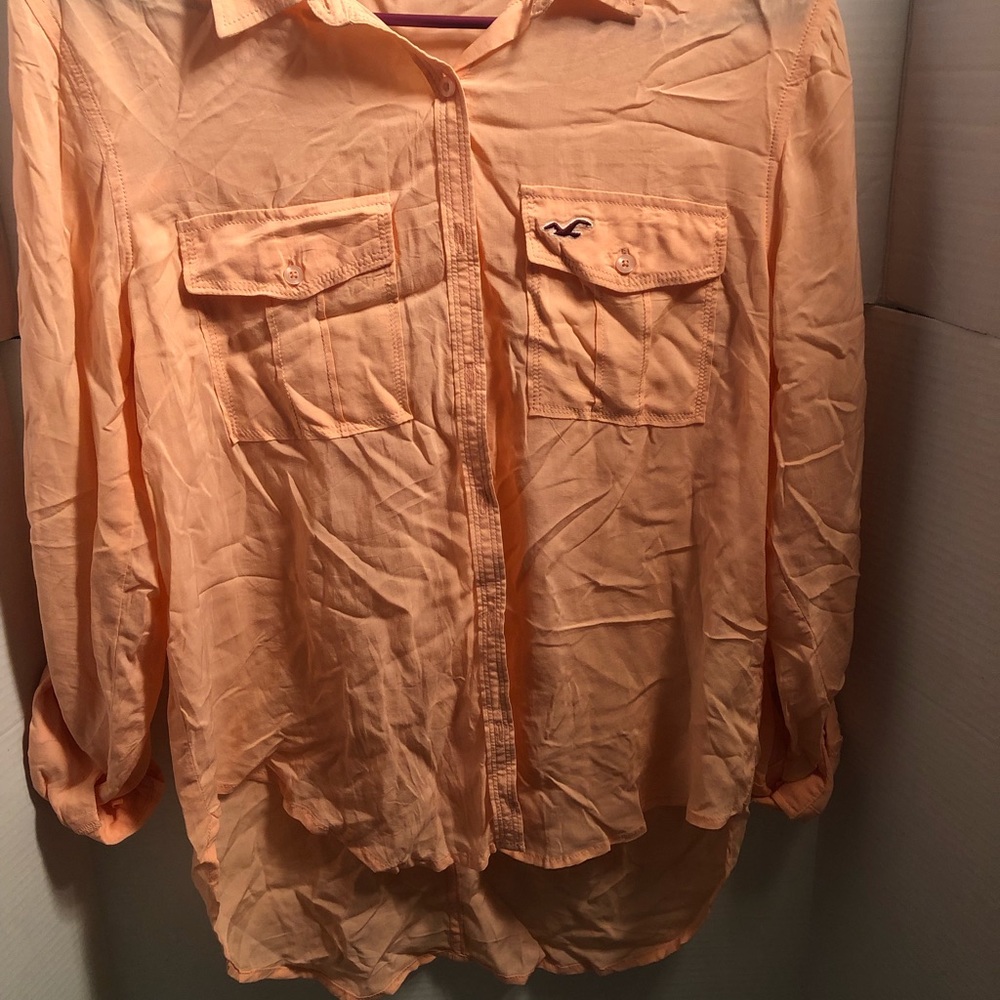 Peach colored blouse